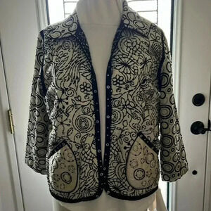 YAK MAGIK JACKET REVERSABLE Black and White pattern size Large